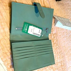 New travel wallet from Simon’s tags still on